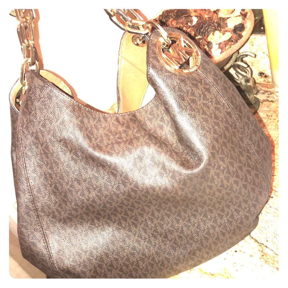Mk purse 4 months old paid 650